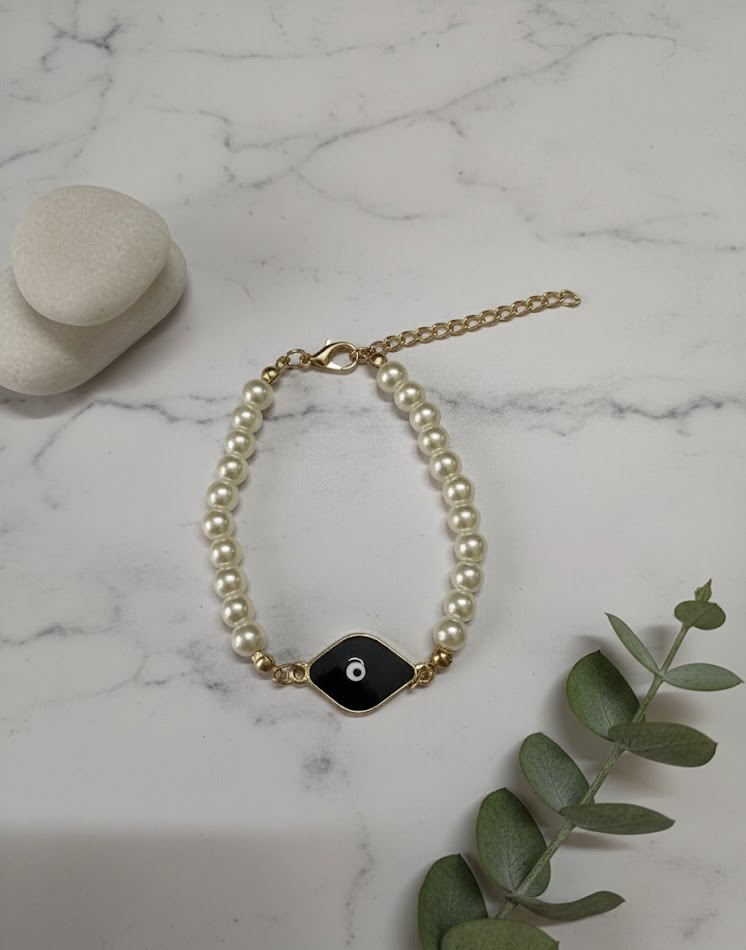 Elegant Pearl Evil Eye Bracelet with Black Enamel Charm