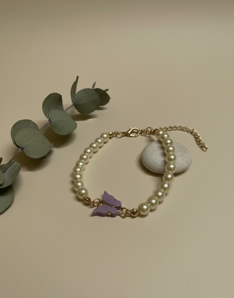 Elegant Pearl Bracelet with Purple Butterfly Charm